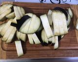 Une image de l'étape 3 de Frites d'aubergines au four aux herbes de Provence et épices.