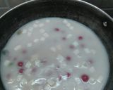 A picture of step 14 of Hibiscus Thai rice balls dunk in coconut milk.