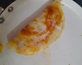 A picture of step 7 of Schezwan sandwich dosa.