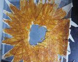 A picture of step 12 of Indian style crescent ring.
