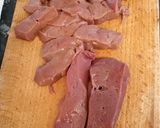 A picture of step 3 of Lambs' liver with mushrooms.