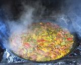 A picture of step 14 of Paella with Vegetables and Meat.