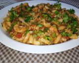 A picture of step 10 of Vegetable Tomato Chicken Macaroni.