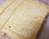 Foto del paso 4 de la receta: Cortaditos de natillas envueltos en choco-coco