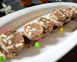 A picture of step 4 of Khajoori nutty roll.