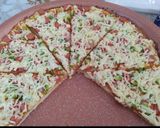 صورة لخطوة 4 من وصفة بيتزا الشورما والخضار اللذيذه والسريعه 🫑🍅🧄🍕🍕😋😋