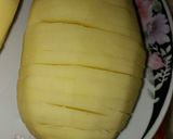 A picture of step 1 of Cheesy potatoes tornado.