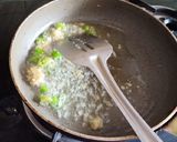 A picture of step 2 of Suji coconut balls.