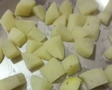 A picture of step 2 of Cheesey Spicy Garlic Potato.