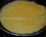 A picture of step 16 of Omurice (Omelette rice).