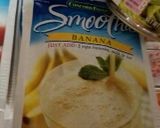 A picture of step 2 of Banana pudding poke cake.