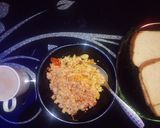 A picture of step 1 of Scrambled eggs and ugali.