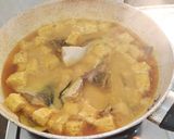 Foto langkah ke 7 dari resep Patin Tempe Kuah Kuning.