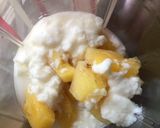 A picture of step 3 of Mango and pineapple smoothie.