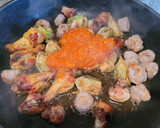 Foto del paso 2 de la receta: Paella de pollo, conejo, butifarra y verduras