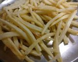 A picture of step 2 of Chilli potato fries.