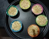 A picture of step 6 of Vegan banana nut muffins- with crunchy oat topping.