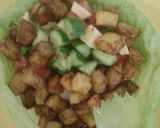 A picture of step 7 of Honey, ginger chicken and Kiwi infused salad lettuce bowl.