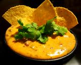 A picture of step 9 of Mike's Cheesy Chili Con Queso Dip.