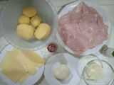 Parmigiana di patate con prosciutto cotto e formaggio