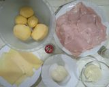 A picture of step 1 of Potato Parmigiana with Ham and Cheese.