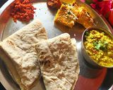 A picture of step 4 of Jowar bhakri with vegetable zunka wadi.