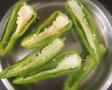 A picture of step 1 of Fry green chilli.