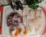 A picture of step 2 of Squid Ink Seafood Pasta.