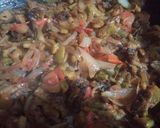 A picture of step 6 of Karela dopyaza.