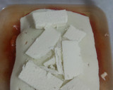 Foto del paso 5 de la receta: Lasaña de pavo, piñones y queso feta en tupper