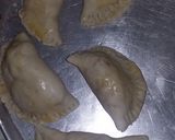 Foto del paso 4 de la receta: Empanadas de queso fundido con masa de pizza