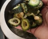 A picture of step 1 of Bittergourd tomato dry curry.