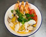 A picture of step 4 of Tom Yum (Thai Hot and Sour Seafood Soup).