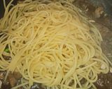 Foto del paso 7 de la receta: Espaguetis con champiñones, ajos, cayena y alcaparras