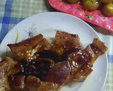 Foto del paso 8 de la receta: Chuleta de cerdo con miel y papines al verdeo