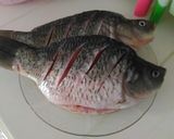 Foto langkah ke 1 dari resep Ikan Mas Bumbu Kuning.