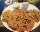 A picture of step 7 of Punjabi paratha thali(radish layered paratha, Yoghurt lassi).