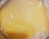 A picture of step 1 of Moong Dal Halwa (moong Dal Atta).