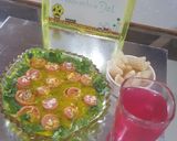 A picture of step 5 of Red khandvi in yellow daal.