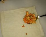 A picture of step 9 of Tikka spring rolls.