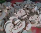 A picture of step 10 of Mushroom masala curry.