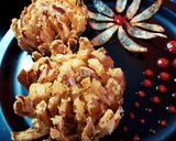 A picture of step 12 of Blooming Onion.