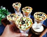 A picture of step 10 of Roti cone Pizza Punch.