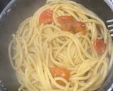 A picture of step 7 of Anchovy and tomato bucatini pasta.