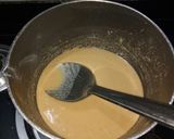 A picture of step 2 of Aata(wheat) Halwa.