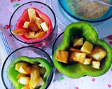 Foto del paso 6 de la receta: Pimientos asados rellenos de patatas fritas y huevos fritos