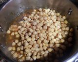 Foto del paso 9 de la receta Garbanzos con alitas de pollo, especia y toque de pimentón