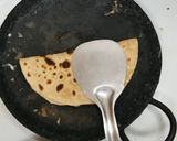 A picture of step 5 of Mexican avocado cheese taco.