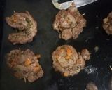 A picture of step 11 of Vegetable stuffed orange beef.
