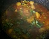 A picture of step 13 of Peas Tomato Potato Curry.
